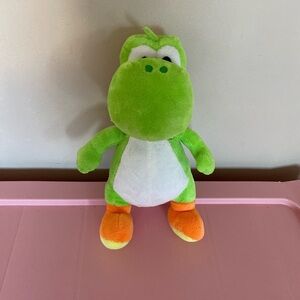 FREE WITH BUNDLE

Yoshi Plush Dinosaur Toy